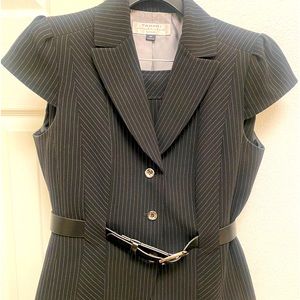 Tahari suit with skirt and belt. Cute short capped sleeves.